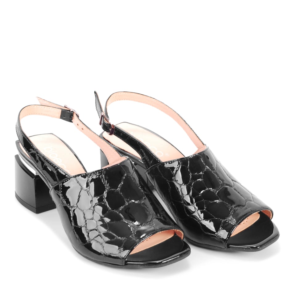  Black lacquered sandals with a crocodile motif