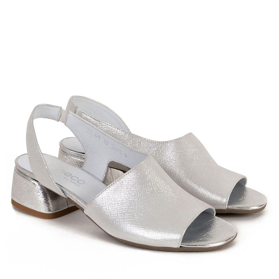  Silver sandals with a covered heel
