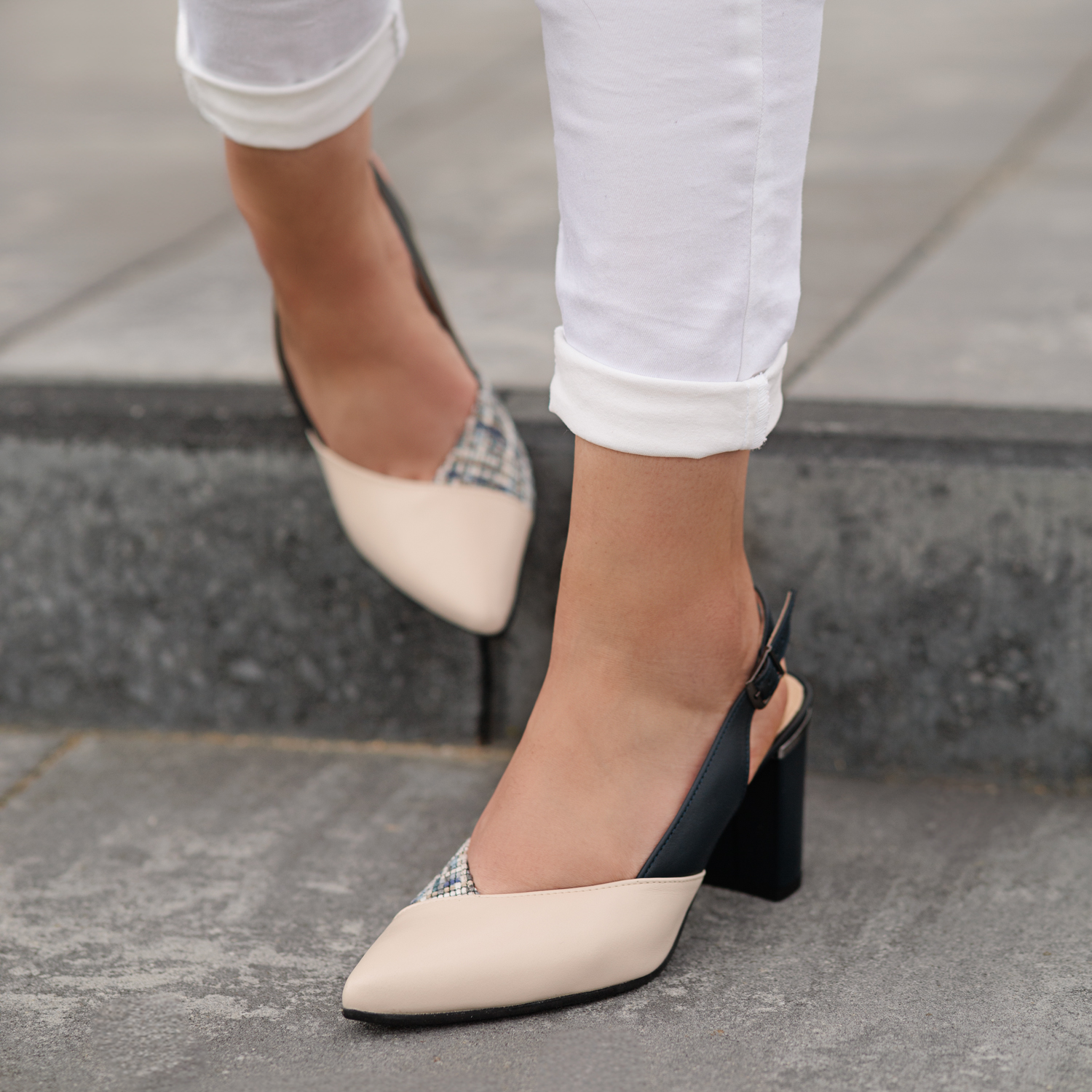  Beige and navy blue leather pumps