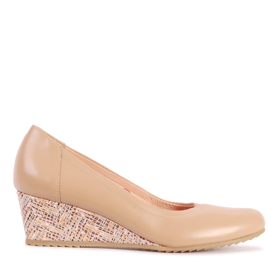 Beige leather wedge pumps