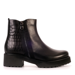 Black leather  boots with a decorative zipper on the side