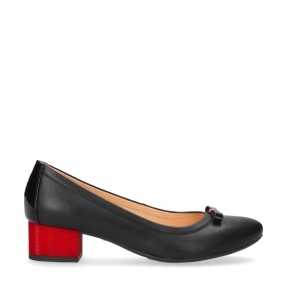 Black leather pumps with a red heel