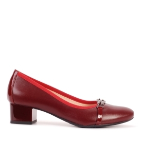 Maroon leather shoes with an ornament