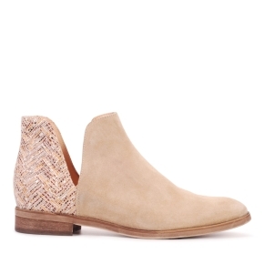 Beige boots with a decorative heel